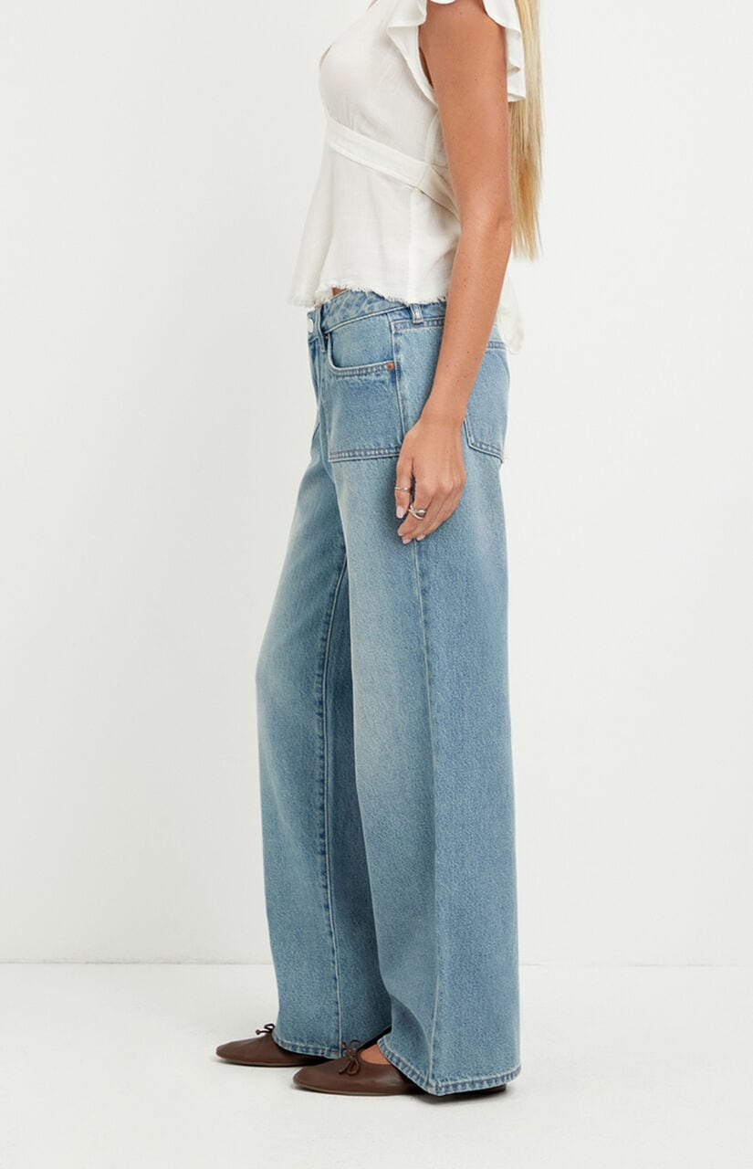 Zoe Low Rise Girlfriend Jeans Exposed Pocket Medium Blue